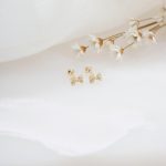 Brinco laço brilhantes